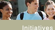 INITIATIVES. Photo slice: group of three students walking