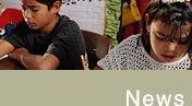 NEWS. Photo slice: boy and girl students at desk working